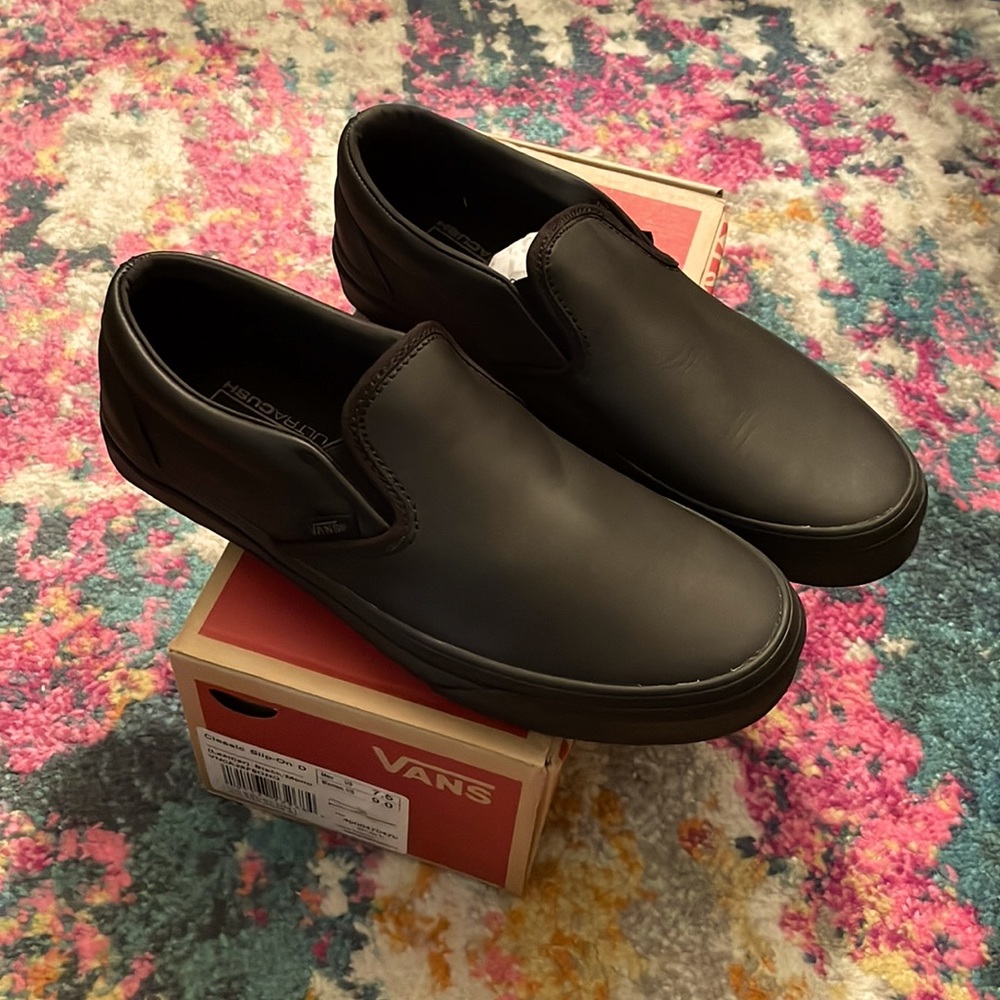 NWOT black leather slip ons
